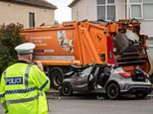 Bin lorry driver arrested for 'drug driving' after refuse truck smashes into three cars and house