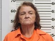 Furious ex-girlfriend, 61, filmed driving her car at former boyfriend... only for stranger to save him thanks to coincidence involving a spider bite