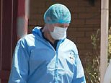Man charged with murder after horror discovery of a body found inside a Queensland unit