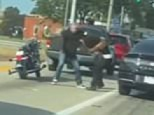 White man filmed yanking black woman by her hair and beating her with belt during terrifying road rage attack