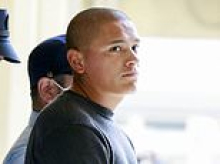 US Marine seen for first time after he was accused of murdering woman, 39, while serving on Japanese island notorious for rowdy troops