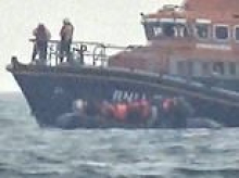 Small boat carrying 32 migrants intercepted a mile from Dover after someone onboard calls 999