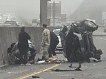 Mother, 35, deliberately crashed car on interstate near Seattle then tried to stab her two daughters to death, prosecutors say