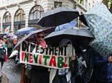 ROBERT HARDMAN: Hiding behind umbrellas, the ghouls marching for Hamas on the October 7th anniversary...