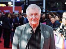 BBC apologises after paying tribute to British movie composer George Fenton by playing song from still-alive jazz star George Benson