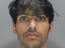 Moment phone fraudster who stole £200,000 crypto cash and splashed out on gold grills, plush apartment and luxury Dubai trips is arrested at Heathrow