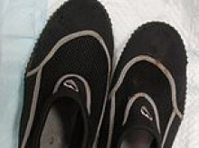 Police release images of wetsuit and swimming gear after unidentified body is found off exclusive Sandbanks peninsula