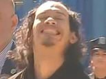 Face of evil: Laughing boyfriend smirks as he's arrested for pushing girlfriend and baby off 15th floor balcony