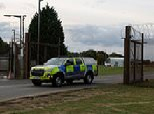Police are probing Russia link after two Latvian nationals 'broke through perimeter fence' at RAF base used by US military intelligence