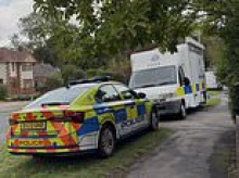 Boy, 15, was stabbed three times by masked men who also knifed his father in unprovoked midnight house raid as both fight for life in hospital
