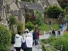 They shove camera phones through our letterboxes and now we've had enough: Residents of Britain's 'most beautiful village' rebel against the Instagram-happy tourists
