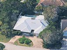 Rotting Florida mansion goes up for auction after becoming neighborhood eyesore for nearly a decade in exclusive coastal enclave