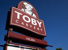 No weigh! Fury as Toby Carvery chef is filmed carefully weighing a slice of meat he was serving up