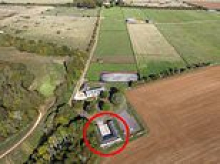 Businessman secretly living inside a 'granny flat' hidden inside a horse stable on his £2.25million Cotswolds estate for nearly TEN YEARS must tear it down
