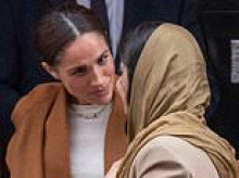 A 'gracious duchess' ritual and the 'intentionally intense' hug: Meghan's 'dramatic' embrace with Malala was bid to grab attention as she made first public appearance in UK since Queen's funeral, experts say