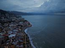 Holidaymakers warned against all but essential travel to Mexican resort Puerto Vallarta as hurricane Simon with 155 mph winds is set to make landfall