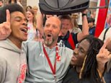 Hilarious moment schoolkids stage a fight to bait their principal into breaking it up... before singing happy birthday to him