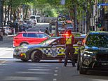 Teen charged after woman allegedly struck by stolen SUV in Melbourne CBD chaos