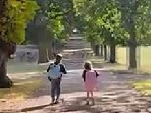 Meghan appears at home in the countryside: Duchess of Sussex shows off her idyllic life in England as she posts clip of Archie and Lilibet on a stroll with their dog