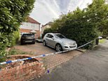 Neighbour of boy, 15, stabbed three times by masked men who also knifed his father in unprovoked midnight house raid recalls being woken up by horror screams