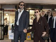 The publicity-shy wife standing by Russell Brand's side: Laura Gallacher steps into the spotlight as she joins him at court for his rape trial - after couple asked fans to 'pray' for them