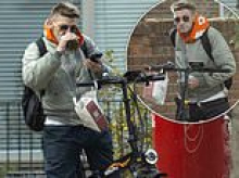 Troubled Peaky Blinders star Paul Anderson counts cash in the street as he runs errands on an e-bike after missing out on Netflix movie