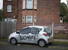 Homes and cars on Salford estate are defaced with anti-HMO slogans in graffiti crime spree: Boy, 13, is arrested