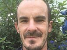 Abuse hurled at notorious paedophile Ashley Griffith as an extradition order to face 180 more charges is granted: 'Rot! Brimstone!'