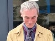Football fan, 62, drank five cans of lager at 12.30pm and then 'deliberately threw himself off a stadium's upper tier' in bizarre FA Cup incident which left a woman injured