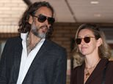 'She's absolutely besotted with him and always has been': Why Russell Brand's wife Laura is standing by him during his rape trial as insiders tell KATIE HIND how she 'tamed' him, what her family think and meeting when she was 19