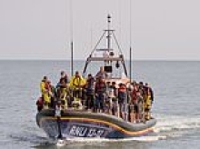 Children of RNLI lifeboat volunteers are bullied at school because their parents rescue migrants in the English Channel