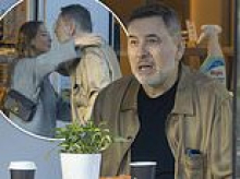 David Walliams looks ashen on a coffee date with a female friend as he is seen for the first time since being 'cancelled' over 'inappropriate behaviour towards women'