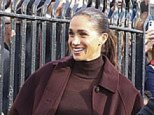 SHANE WATSON: Meghan's not playing it safe anymore. She's back - in £3,300 of stealth wealth burgundy... without those pesky tights