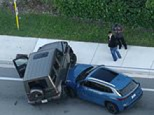 Shocking moment Mercedes G-Wagon being chased by cops drives on top of SUV being driven by mom with two children inside