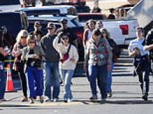 Armed citizen chased teen Oregon gunman into elementary school and shot him dead minutes into attack: Police say hero saved multiple children's lives