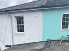 Judge gives couple 'squatters' rights' over 48cm sliver of land after new neighbours tried to have 40-year-old kitchen extension demolished over tiny boundary breach