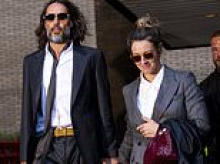 Russell Brand turned into a 'wild-eyed maniac' when he tried to drag MTV worker into male toilet and assault her, court hears