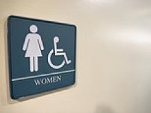 Female civil servants warned they may be guilty of 'unlawful harassment' if they challenge transgender colleagues over which toilets they use at work