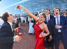 Aussies let their hair down at the Caulfield Cup as thousands take in the spring sunshine for a day at the races