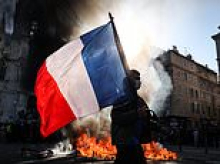 Macron is blasted for dancing at a Celine Dion concert with Brigitte as more than 160 are arrested while France burns in riots