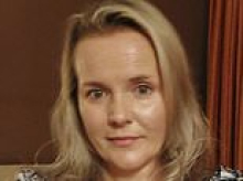 Corrupt senior detective, 47, who accessed police records to give 'tittle tattle' to her nightclub bouncer lover is jailed for eight months