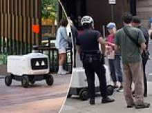 Dystopian moment Philadelphia woman is arrested for blocking delivery robot from completing its task