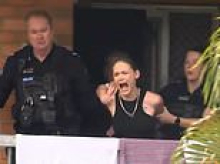 Dog owner arrested moments after interview as runner recovers from horrific Brisbane mauling