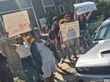 Homeowner sparks fury by boasting of her $1.5m house during spat over a parking space... as protesters descend on her doorstep