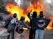Trump blames mass migration for French riots... as Macron vows looters and agitators will pay for seeking 'to bring down the Republic'