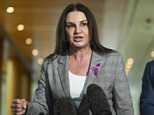Jacqui Lambie lashes out at Pauline Hanson over cartoon mocking her vaginal prolapse: 'Nastiness'