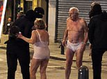 Viral image of elderly couple stripped and surrounded by rioters in France was 'made or edited with AI'