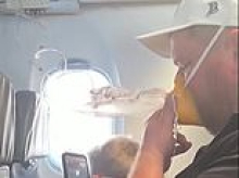Terrified passengers began filming American Airlines emergency landing after noticing issues with its thrust before oxygen masks dropped from ceiling