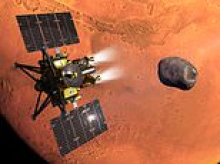 Mission to Mars! Japanese spacecraft begins epic five-year quest to bring Martian moon samples back to Earth for the first time