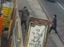 Moment stranger punches pram-pushing Jewish woman in face in anti-Semitic attack - before assaulting three more